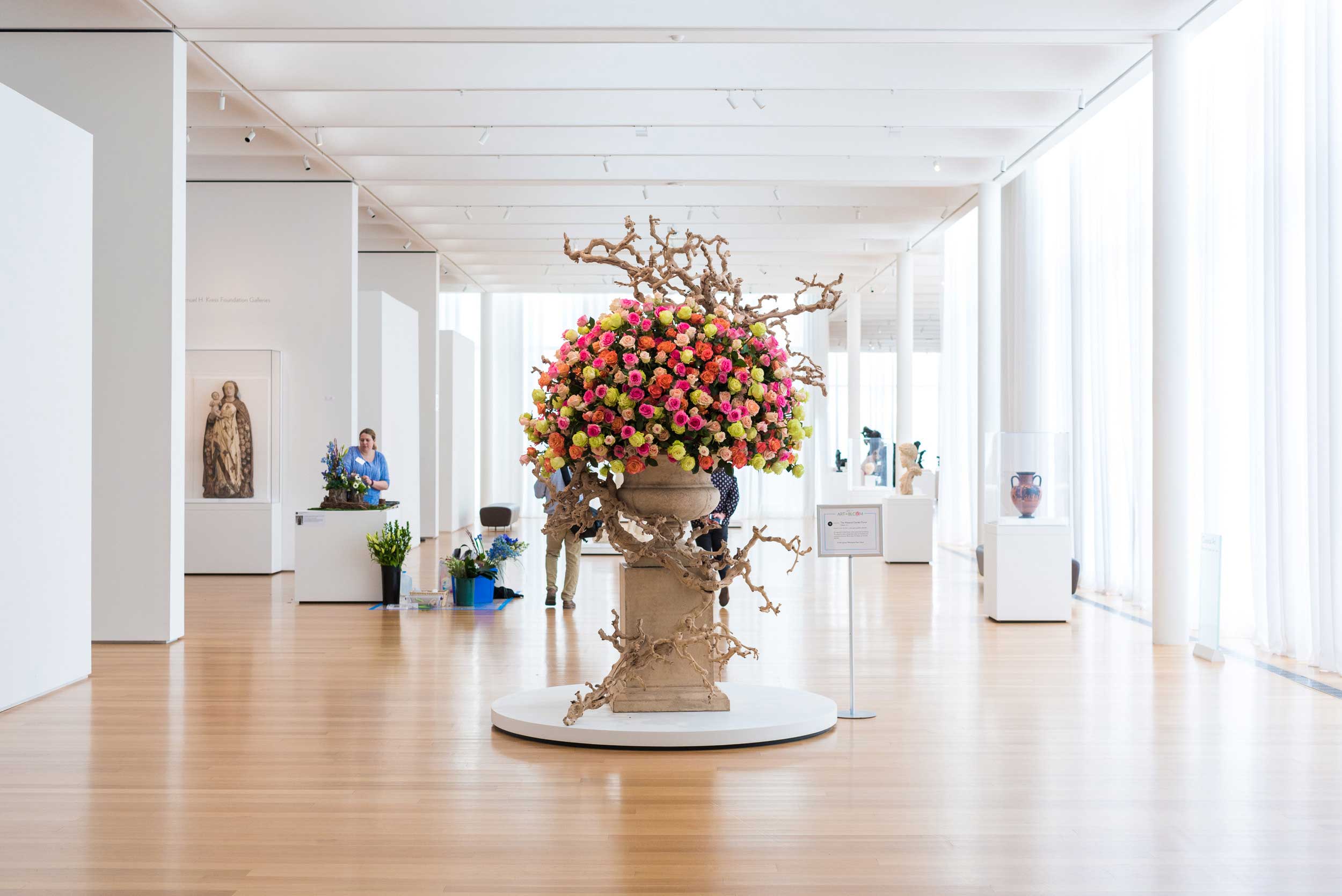 View of large colorful floral arrangement in the North Carolina Museum of Art lobby