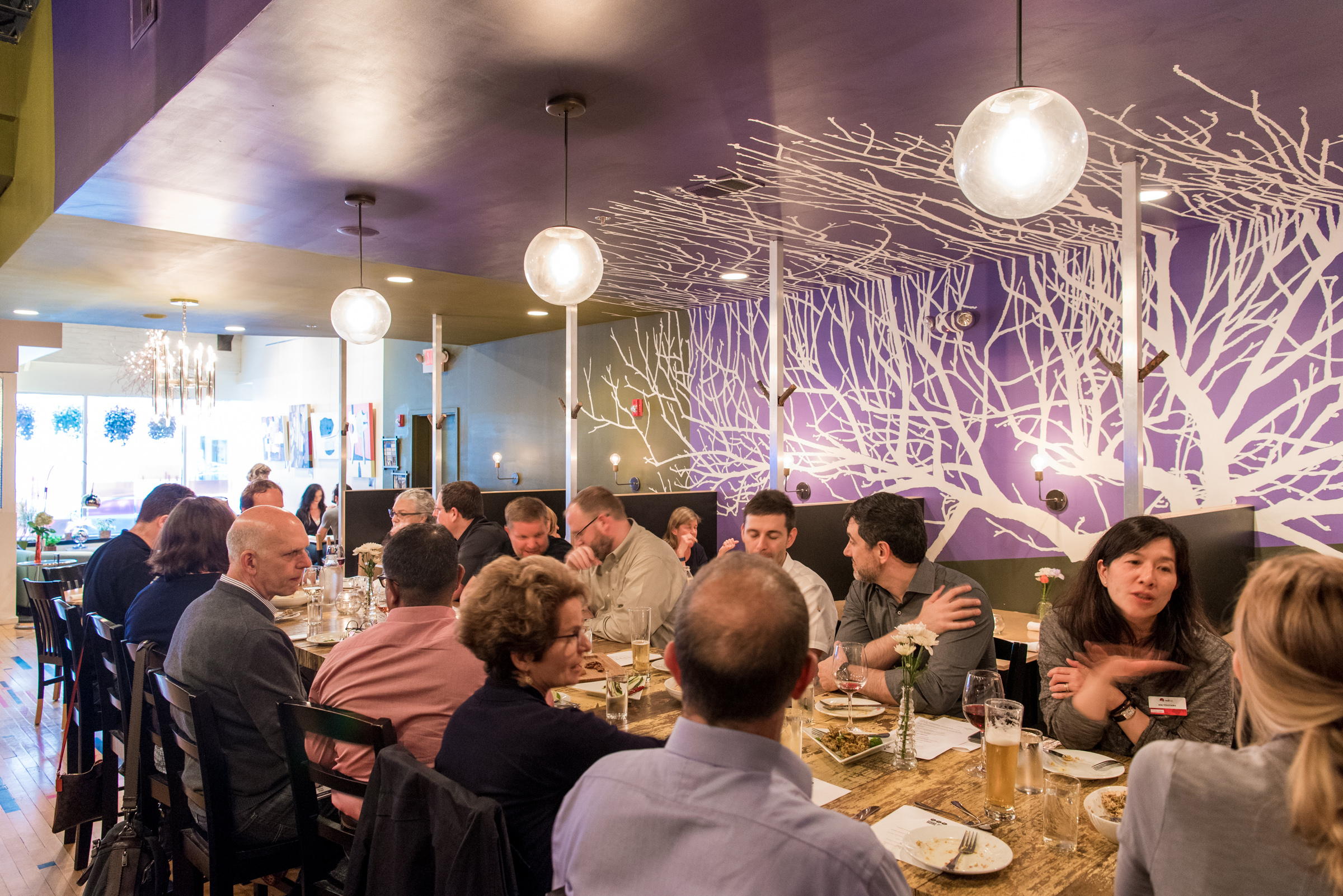 A restaurant filled with a large group in the Triangle.