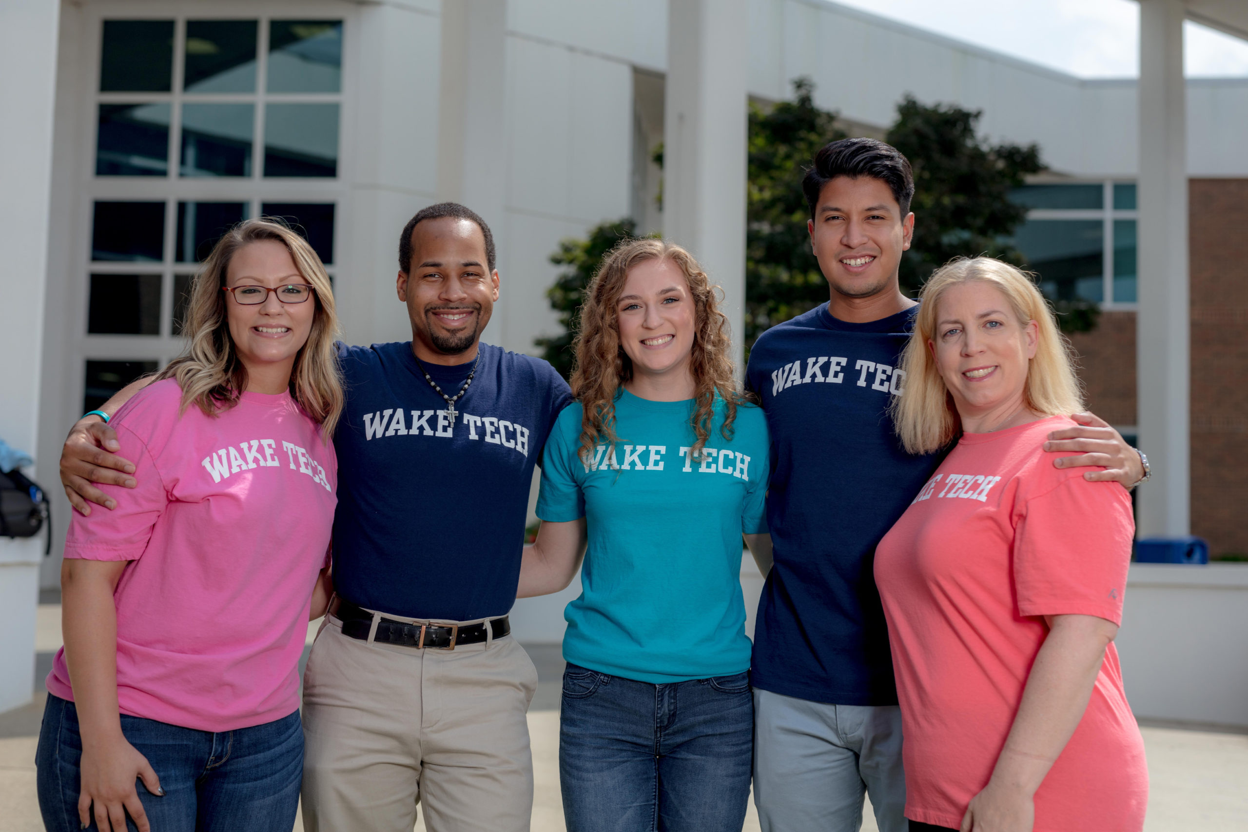 group picture with people wearing wake tech shirts