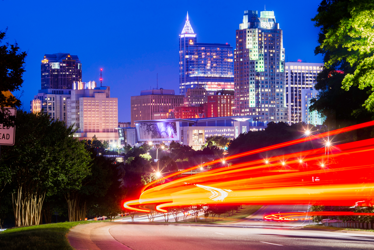 Raleigh skyline with cars driving