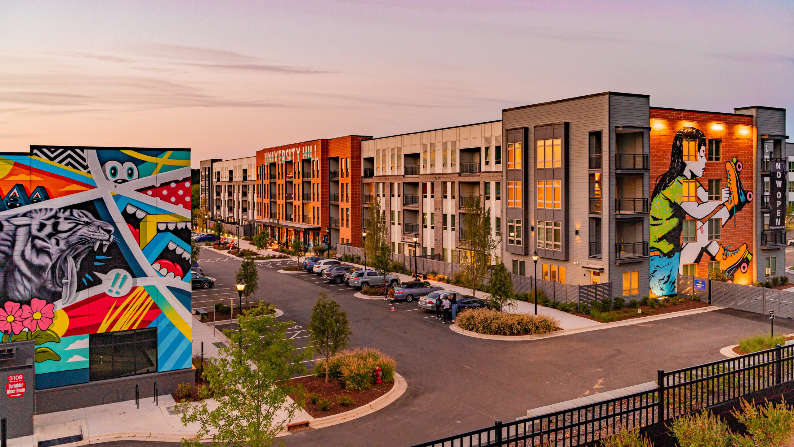 Walls of murals in Durham NC at sunset